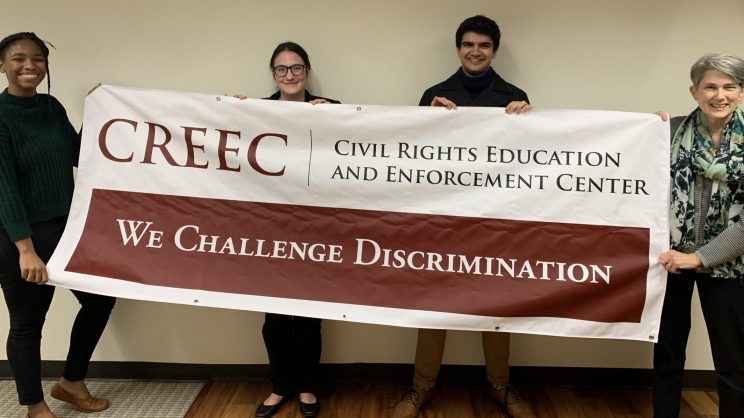 All four Swarthmore affiliates are pictured. The two January 2020 externs, Marieme Diop and Amy Robertson. They are holding the CREEC banner in front of them.